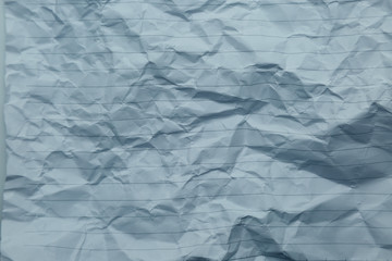 crumpled of blue blank paper with line