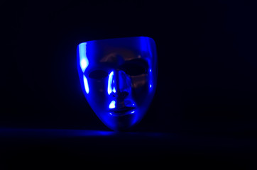 metal mask in blue light