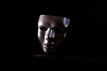 metal mask on black background