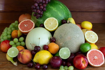 fresh fruits on wooden background