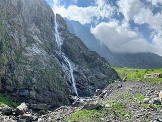 Obraz premium Russia, North Ossetia. Midagrabindon waterfall in the summer