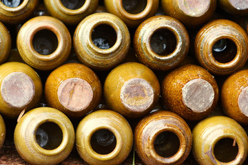 Many earthen pots,Jars on the ground.