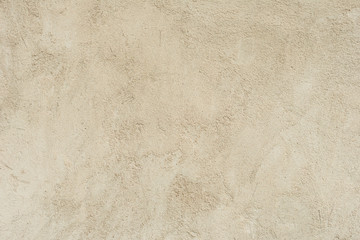 Texture of a concrete wall with cracks and scratches which can be used as a background