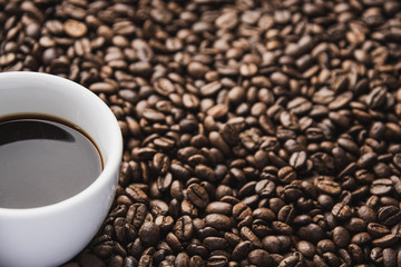 cup of coffee with beans background