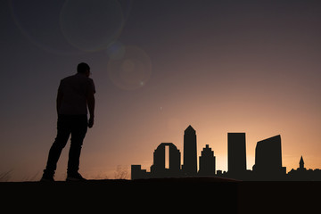 Traveler in front of jacksonville city skyline