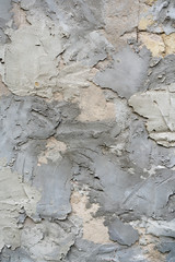 texture uneven plaster. Gray stucco background with careless pieces. Manual plaster wall uneven. Patches on plaster