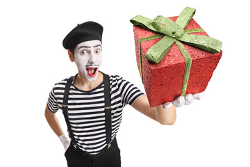 Mime holding a red present box