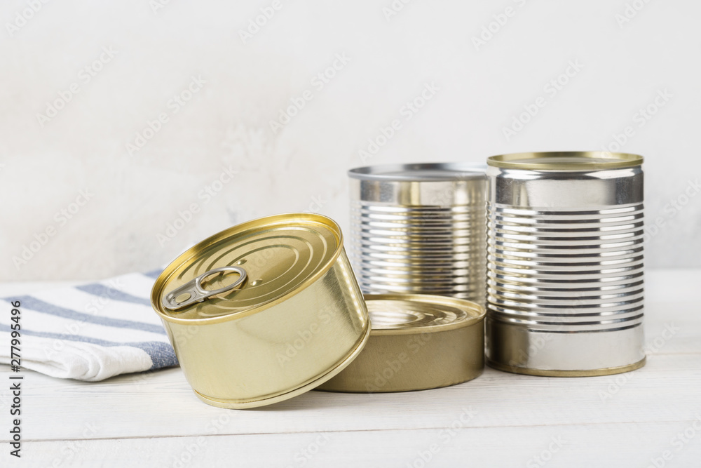 Wall mural Various closed tin cans with food preserves.