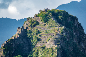 Fototapeta na wymiar View to very top of Hayna Picchu mountain from Machu Picchu