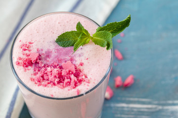 Close up of fruit yougurt smoothie - health living concept