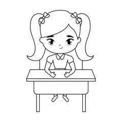 little student girl sitting in school desk