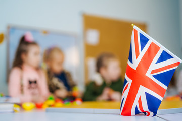 Learn English! School Children. Education in the United Kingdom. Flag of Great Britain.