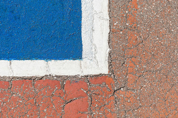 Layout tennis court on the old concrete surface with cracks.