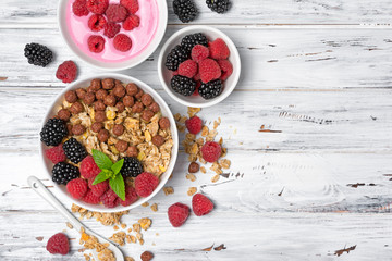 Healthy breakfast - oatmeal with fresh berries and homemade yogurt