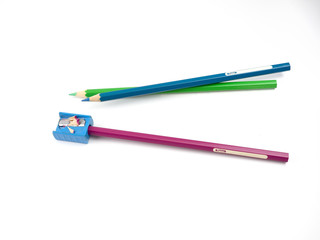 crayon or pencil and sharpener isolated on White Background