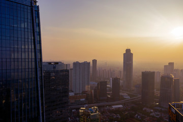 Obraz na płótnie Canvas Jakarta cityscape with high buildings at dawn time
