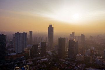 Fototapeta premium Jakarta cityscape with silhouette of skyscrapers