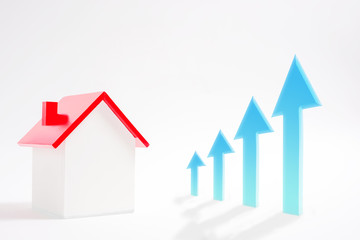 Miniature house and rising graph　家と上昇中のグラフ