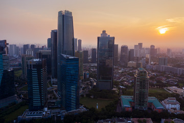 Fototapeta premium Skyscrapers in Kuningan CBD area at sunset