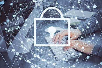 Multi exposure of lock icon with man working on computer on background. Concept of network protection.