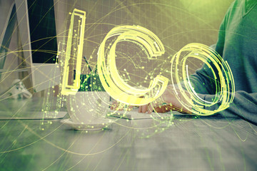 Blockchain theme hud with businessman working on computer on background. Concept of crypto chain. Multi exposure.