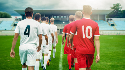 Two Professional Soccer Teams Leaving The Field After Successful Match. Leaving the Stadium After a Match is Over, Going on a Break.