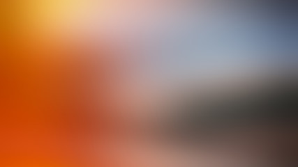 Abstract blurred gradient background. Orange, brown, blue.