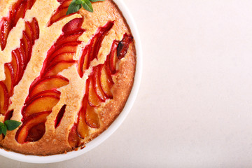 Plum cake in baking tin