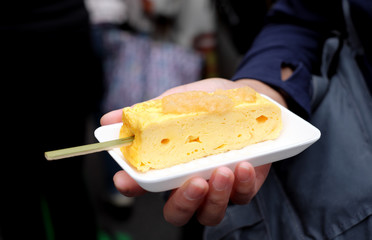 tamagoyaki, a sweet and savory japanese egg roll (japanese rolled omelette) 