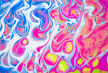 Abstract colorful painting background made in fluid art technique. Trendy pattern.