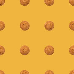 Seamless repeating yellow pattern of cookies