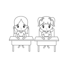 little student girls seated in school desks
