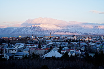 Beautiful mountain view over Reykjavik city during sunsetin winter with view from perlan
