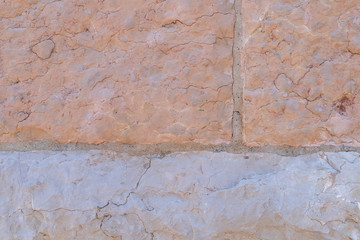Texture of old ancient stone wall of a spanish church close up