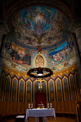 The beauty of the Temple of the Sacred Heart in Barcelona.Temple of the Sacred Heart wall paintings. Icons and the story of the beginning of life.