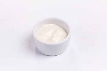 Obraz na płótnie Canvas sour cream in the bowl