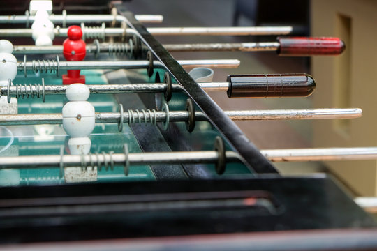 Table football game with red and blue players