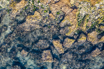 Aerial view of the sea and stones in the summer