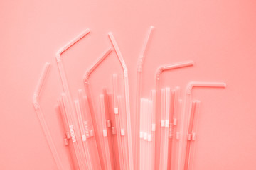 Colourful plastic straws on blue background. Cocktail tubes. Place for your text. Say no plastics. Plastic free concept.