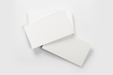 Mockup of business cards stack at white textured background. Design concept. Template for branding identity.