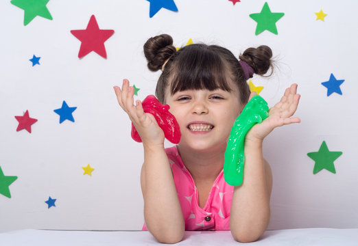 Child Play With Slime. Kid Squeeze And Stretching Goo Toy Called Slime.