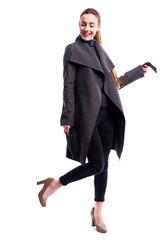 Isolated studio shot, stylish clothes, fashion, spring autumn. Young woman elegant in fashionable coat