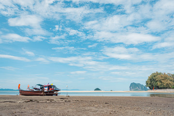 Fototapeta na wymiar Long Tail Boat on tropical sand beach, Andaman Sea, in Thailand