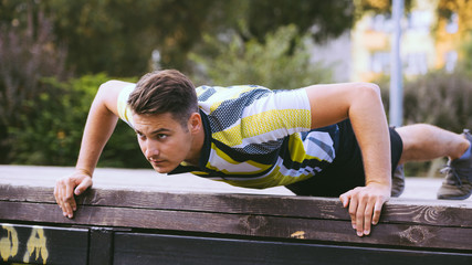 Man doing push ups outdoor