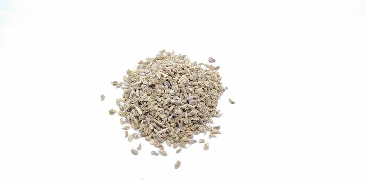 A picture of carom seed's on a white background