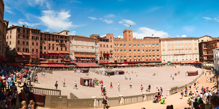 Siena, Italy - August, 2013: Plaza del Campo. Preparing for the annual competition - panorama