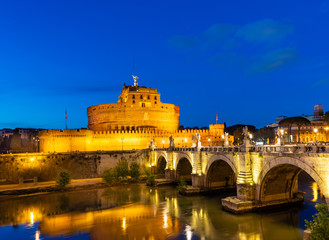 Night view of Castle Sant Angelo (Mausoleum of Hadrian), bridge Sant Angelo and river Tiber in Roma. Italy.