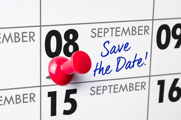 Wall calendar with a red pin - September 08