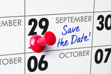 Wall calendar with a red pin - September 29