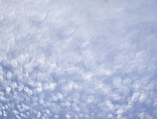 Light-blue background of shining drops of water